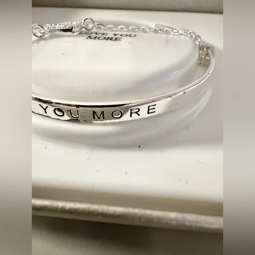 NWT silver plated bracelet w/attached charm, coach charm, & leather purse charm - Picture 7 of 16